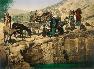 Bedouin women drawing water by Swiss Photographer